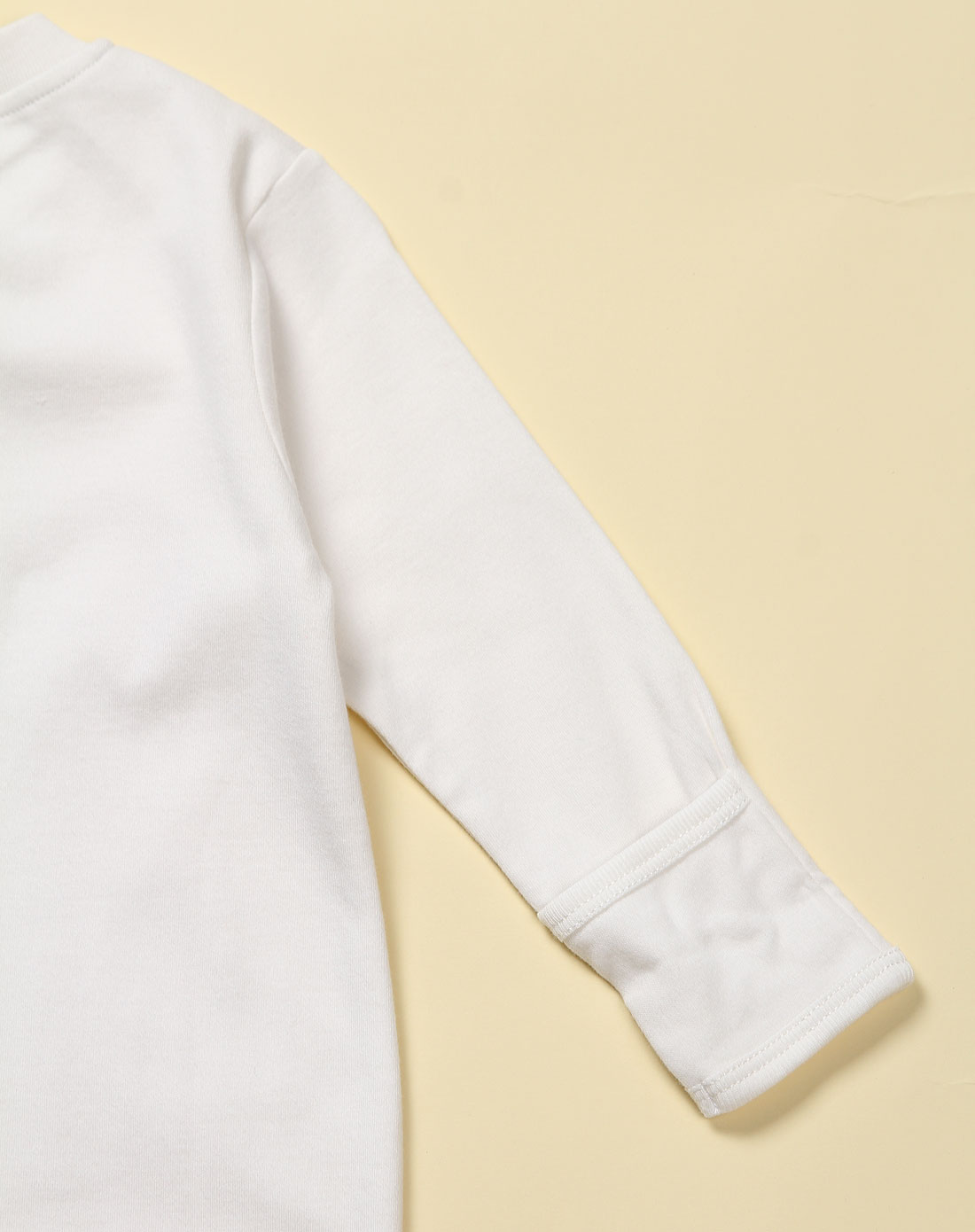 中性米白色纯色连身长袖哈衣